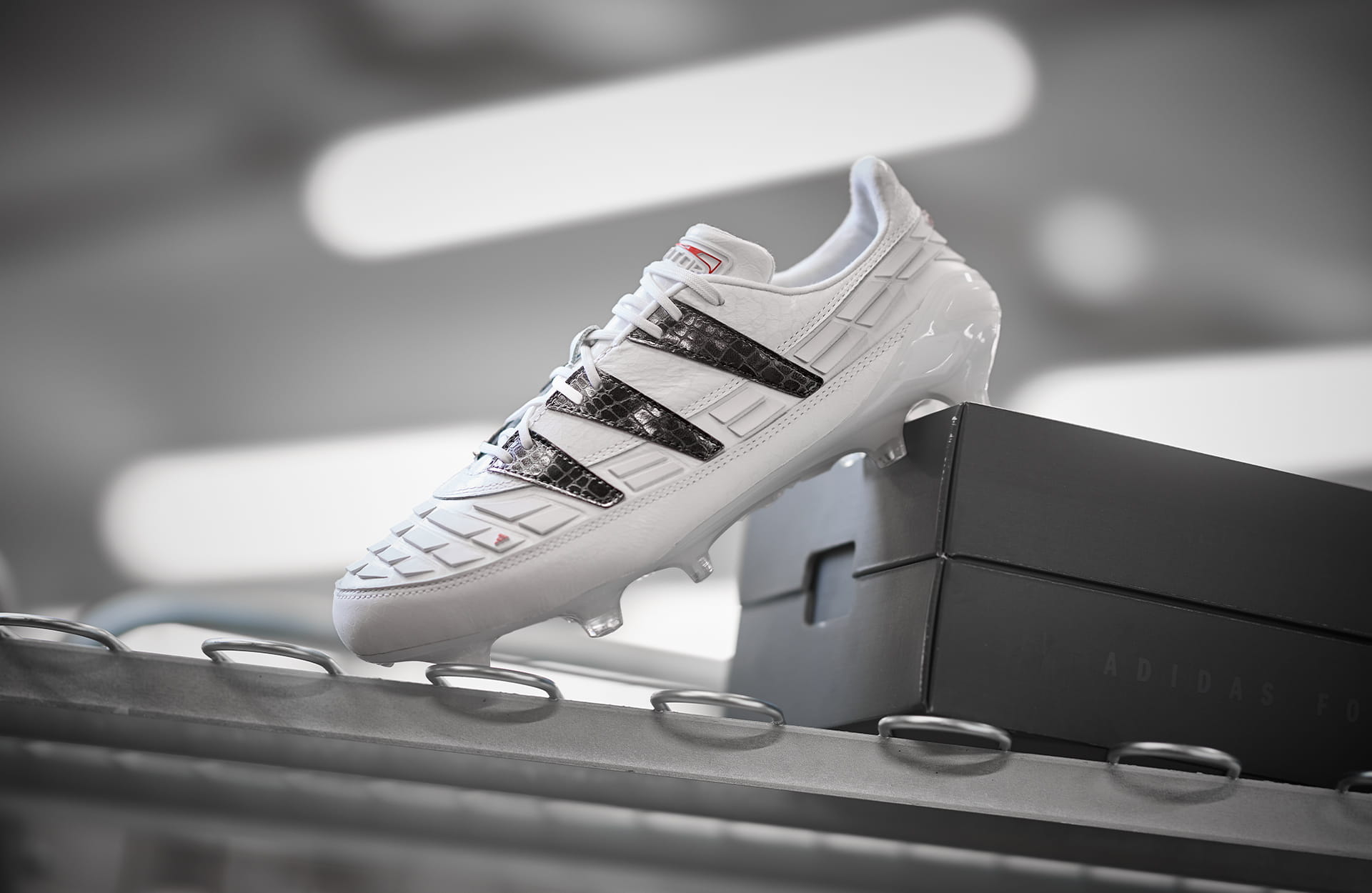 Adidas Predator 94 Reverse 2026 in white with black Three Stripes and Solar Red accents β an inverted version of the 1994 original